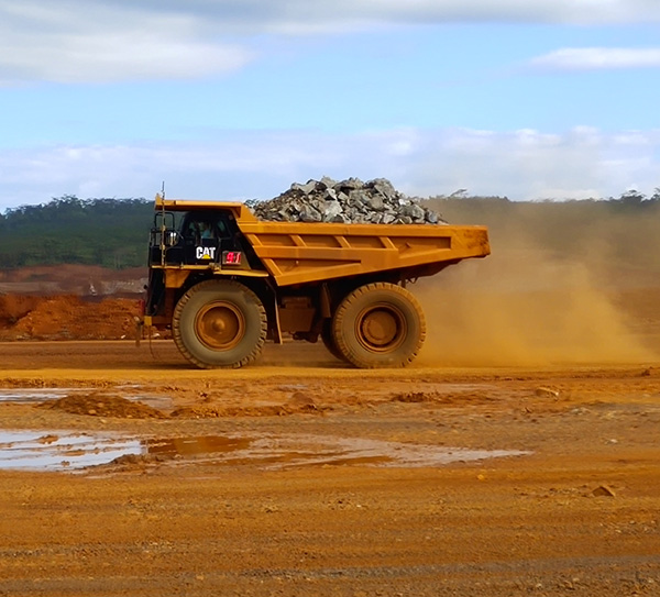 CAT 777 Dump Trucks Equipped with 27.00R49 Off the Road Tires Running on Nickel Mine